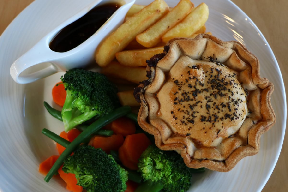 Hot meal served by kitchen staff