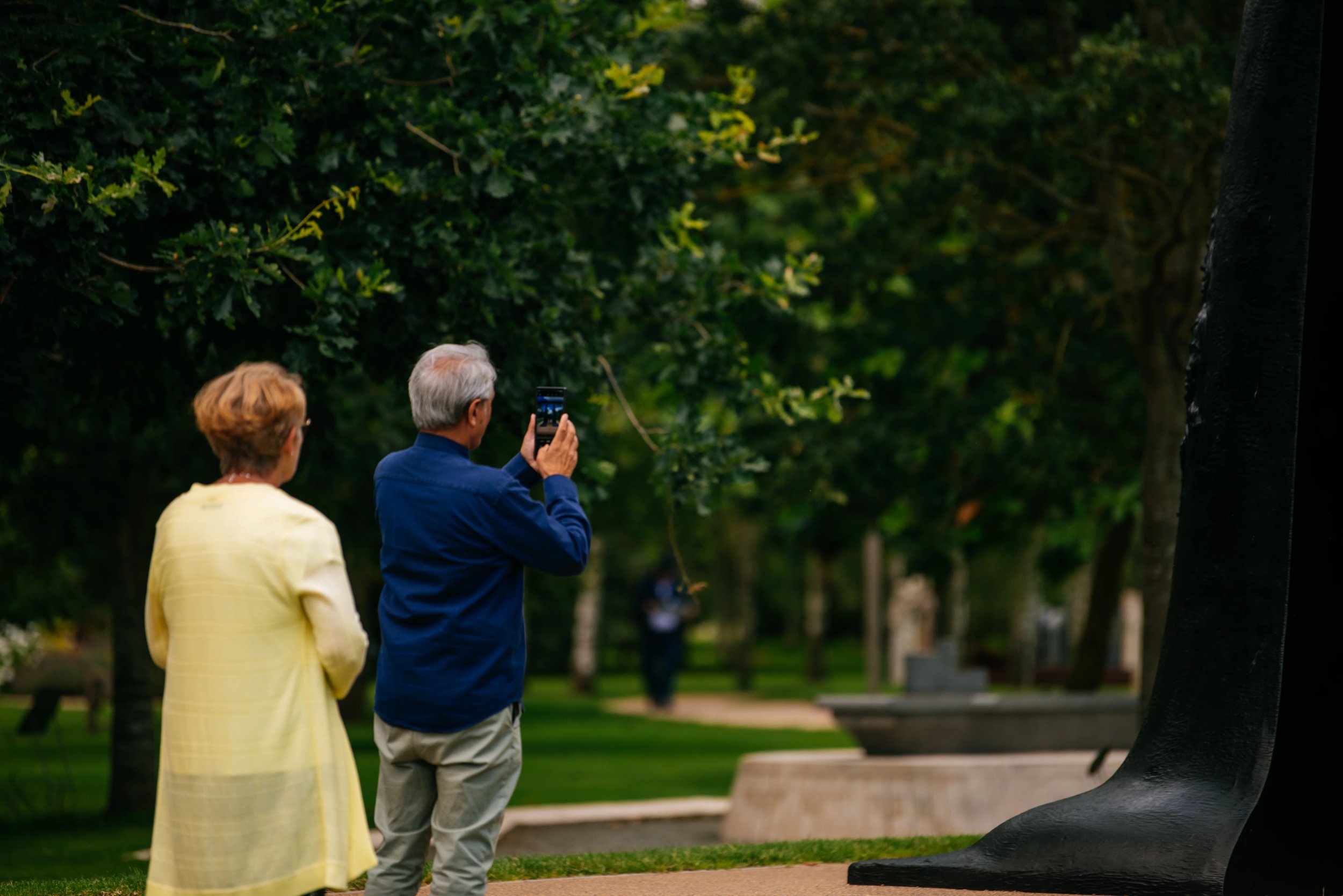 Visitors taking photographs of the Submariners Memorial