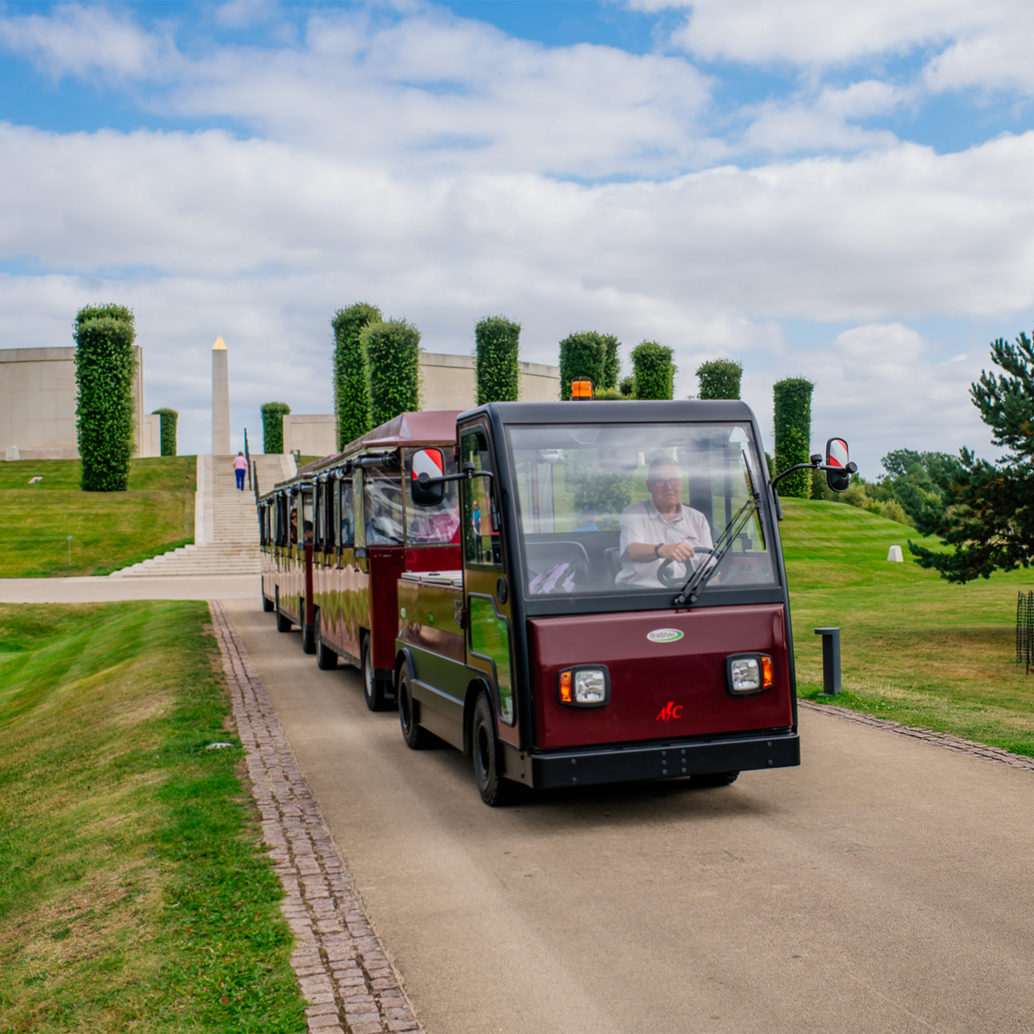 The land train driving past the Armed Forces Memorial
