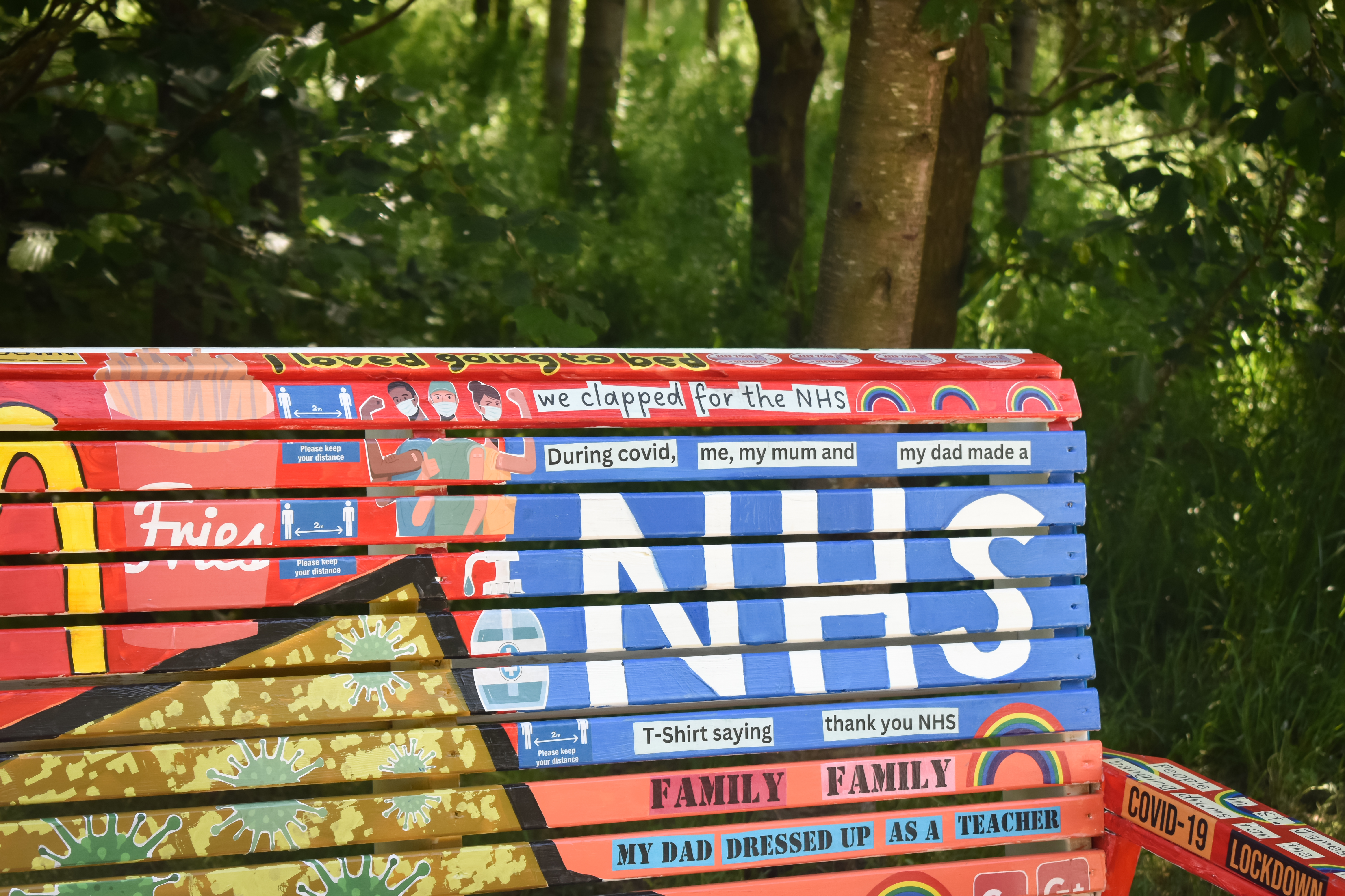 A memory bench produced by young people at St Andrew's Youth Club, exploring the importance of the NHS and family