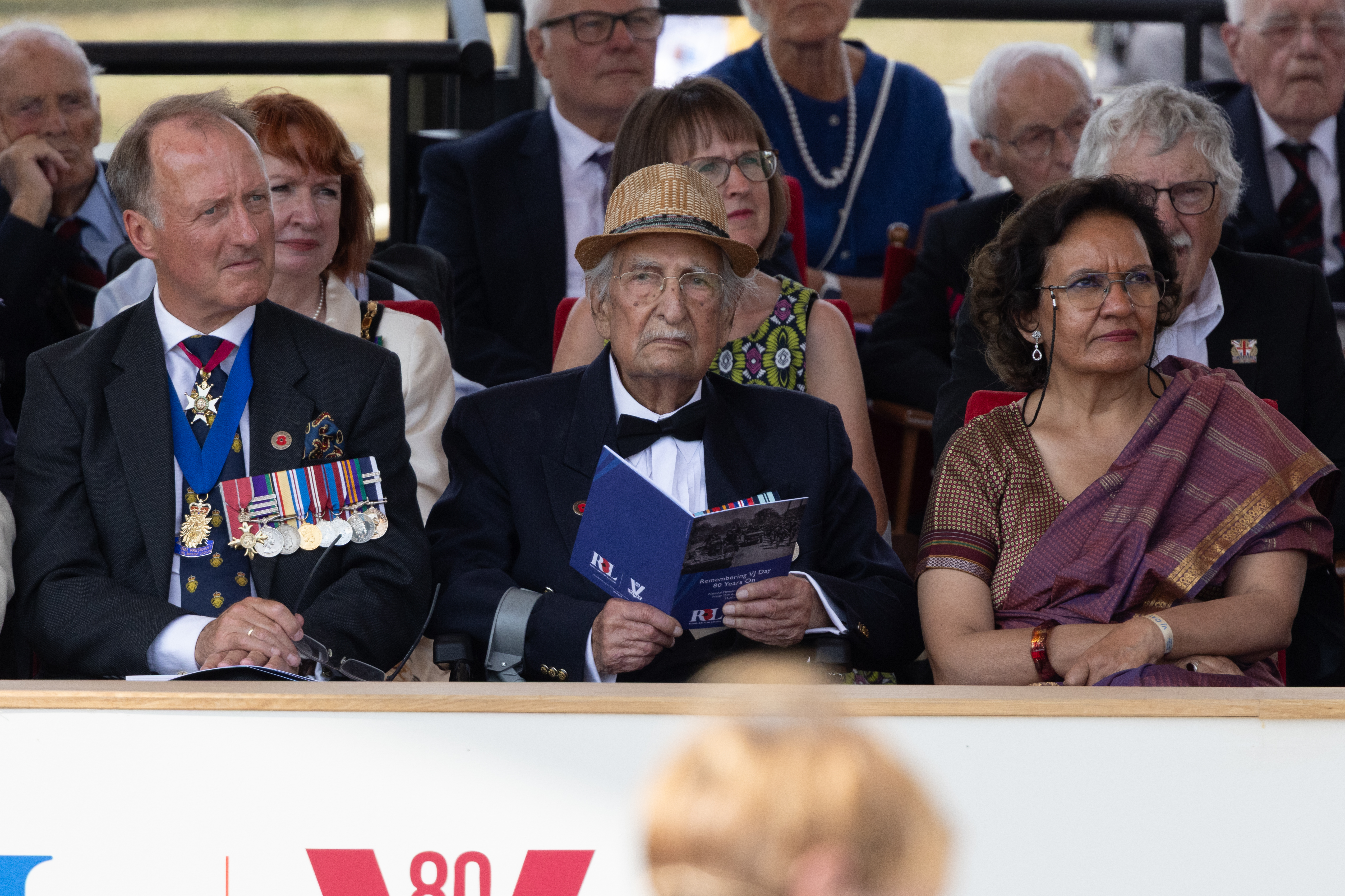 Veteran Yavar Abbas reading an order of service