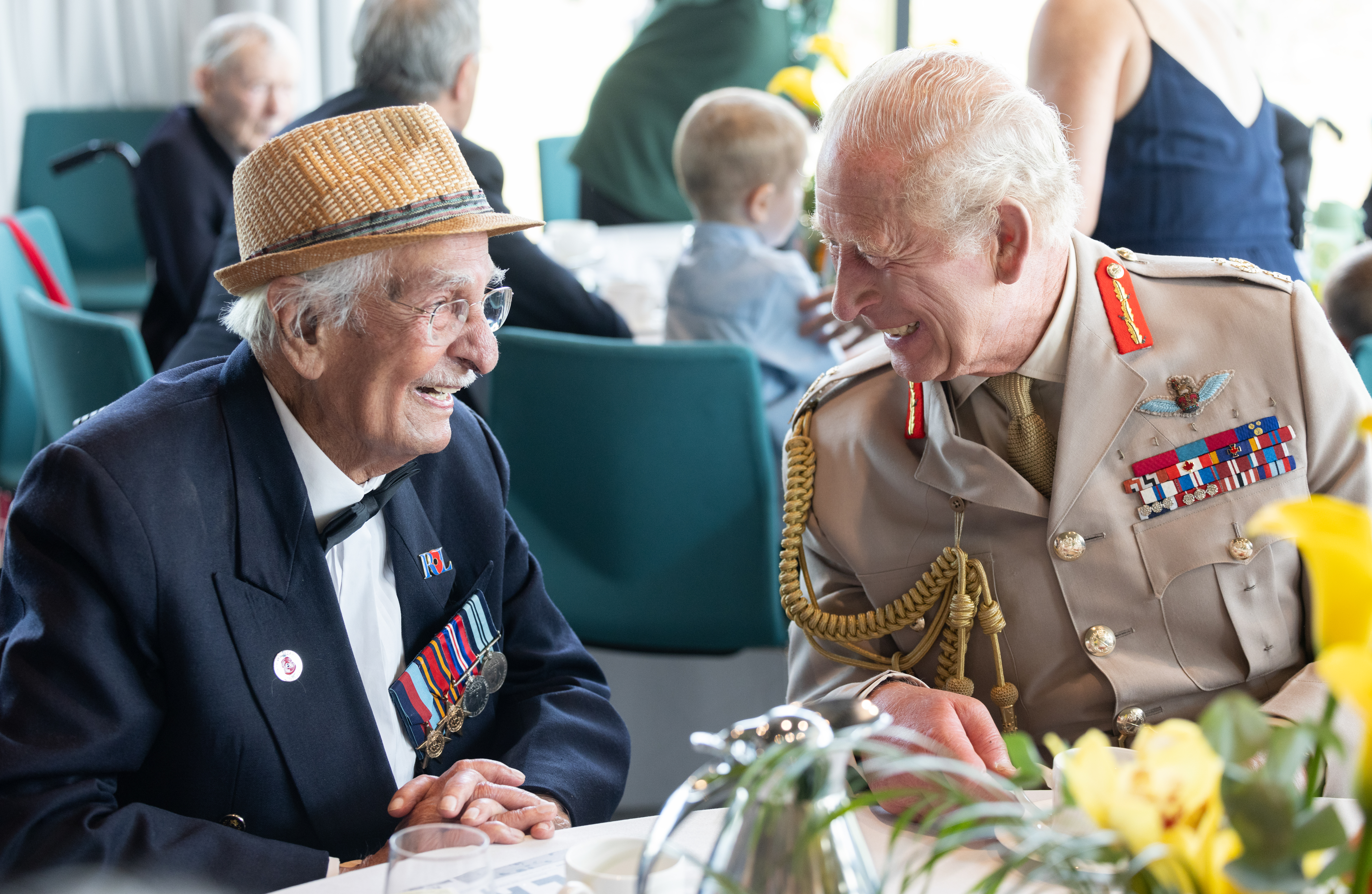 Veteran Yavar Abbas laughing with King Charles III