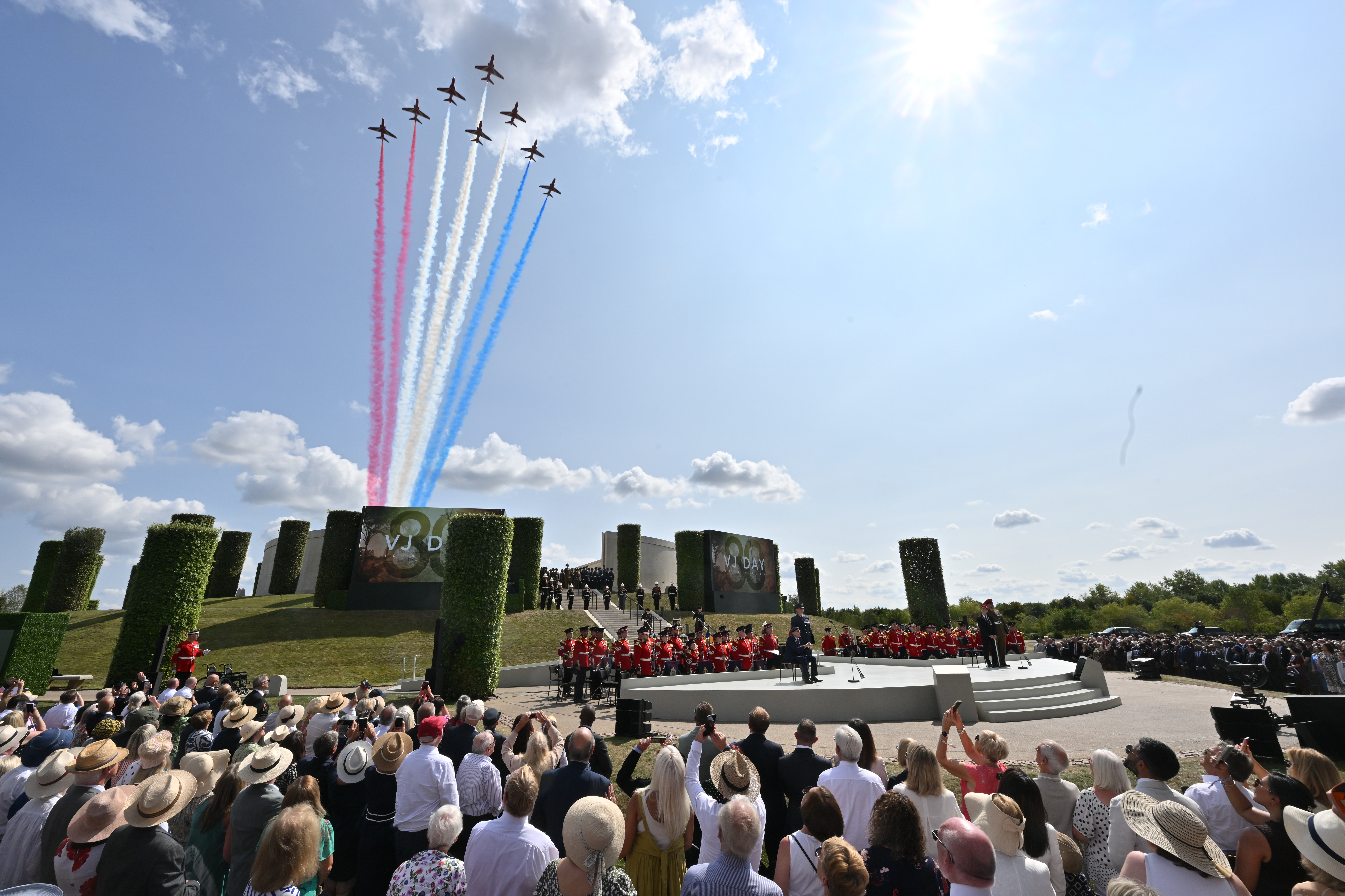 The Red Arrows flying over the Armed Forces Memorial service area on the 80th anniversary of VJ Day