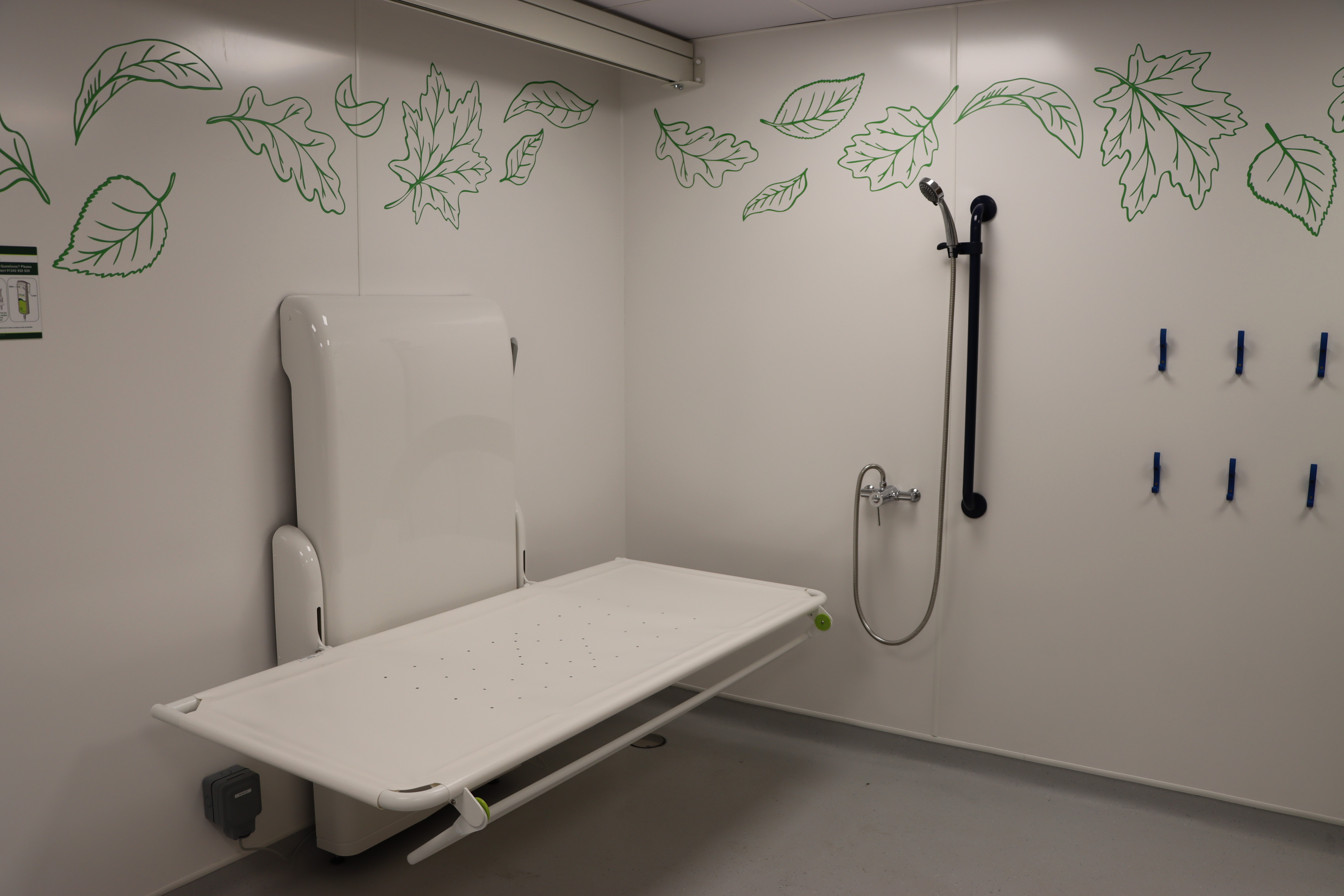 Adjustable Bed and shower within the Changing Places Facility