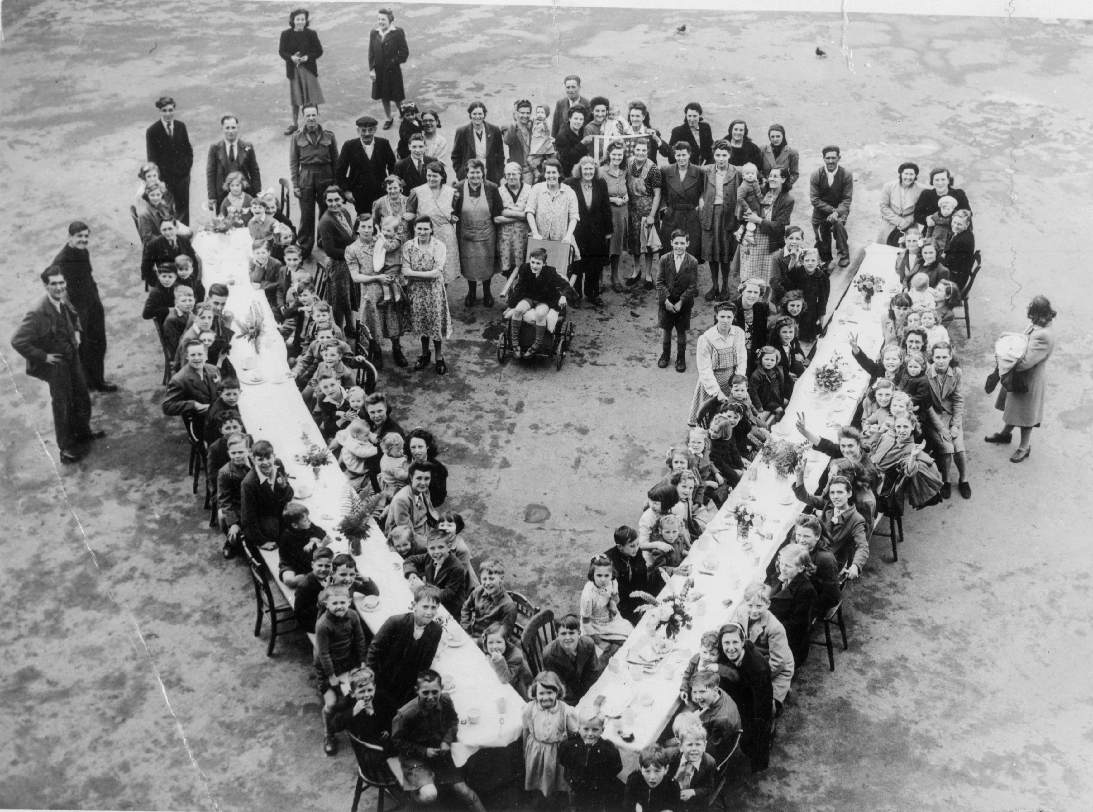 A children's street party is held in London on VE Day 1945