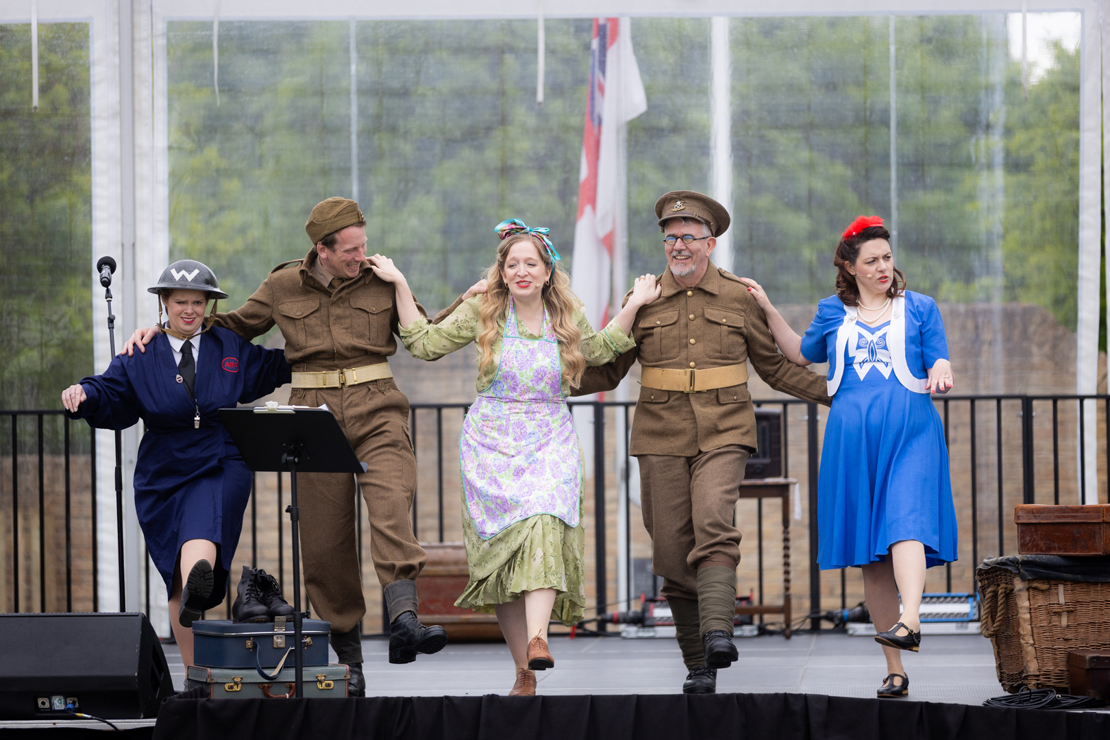Costumed interpreters on stage