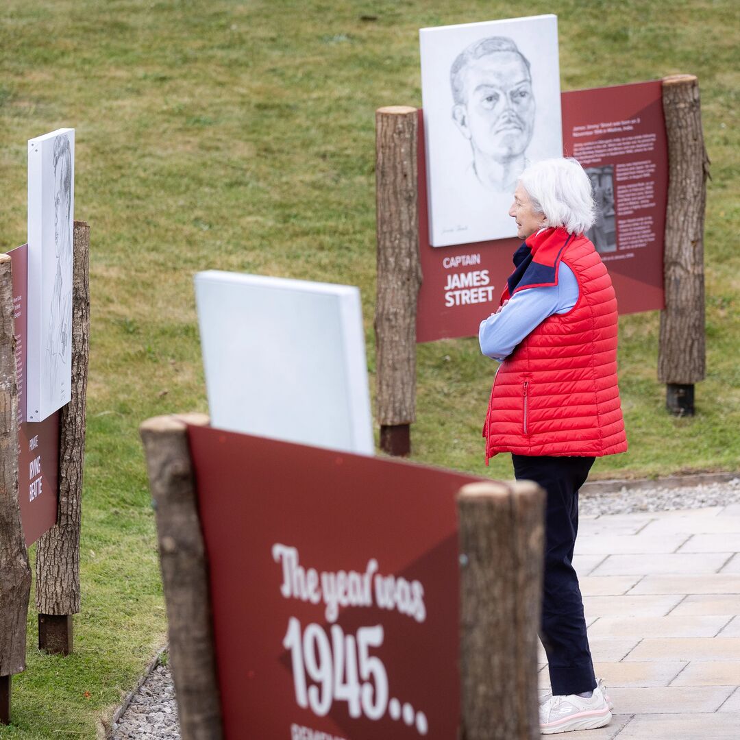 A woman looking at the outdoor exhibition