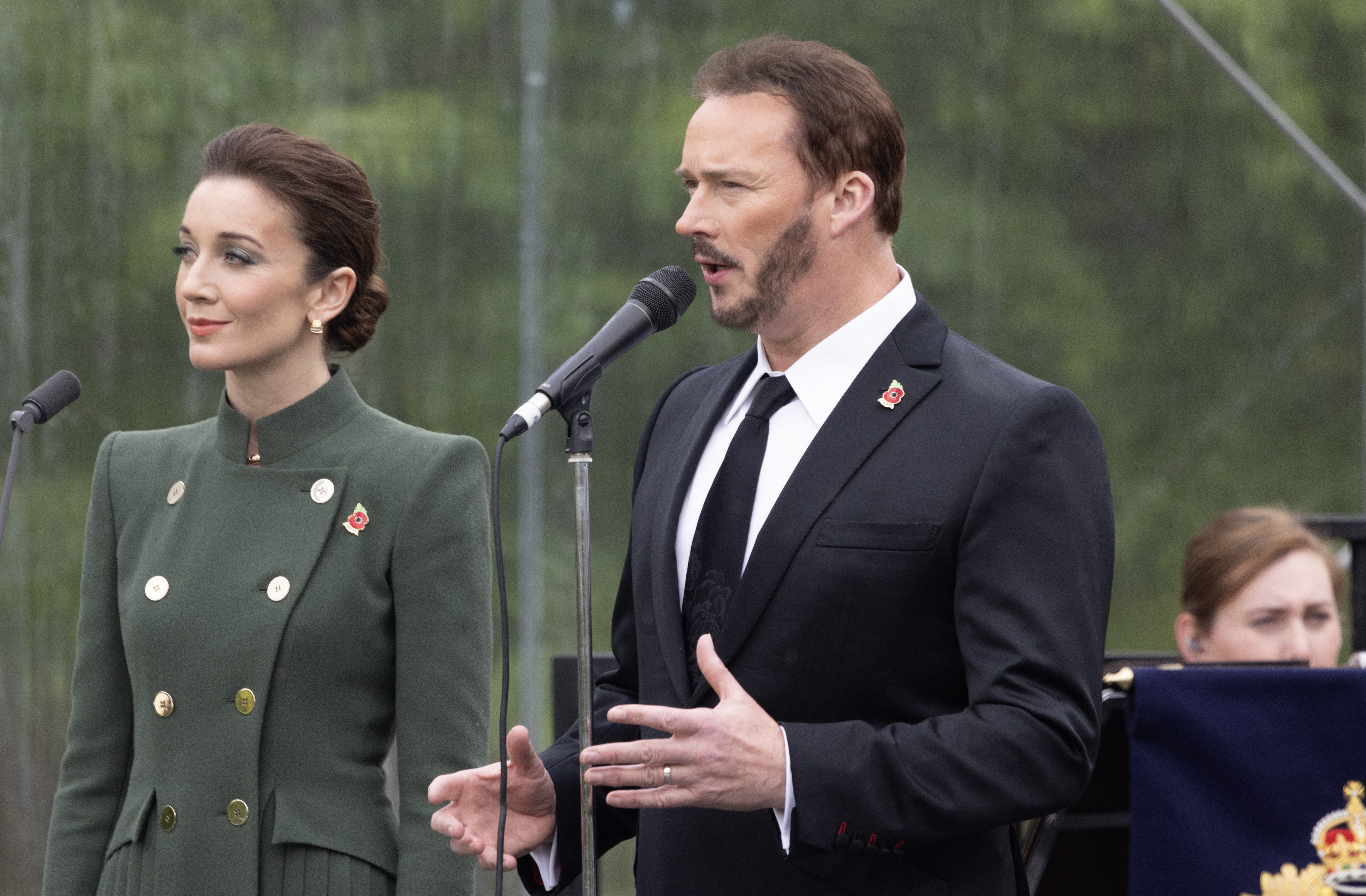 Singers Russell Watson and Carly Paoli sing  at the VE Day 80 Remembrance Centre