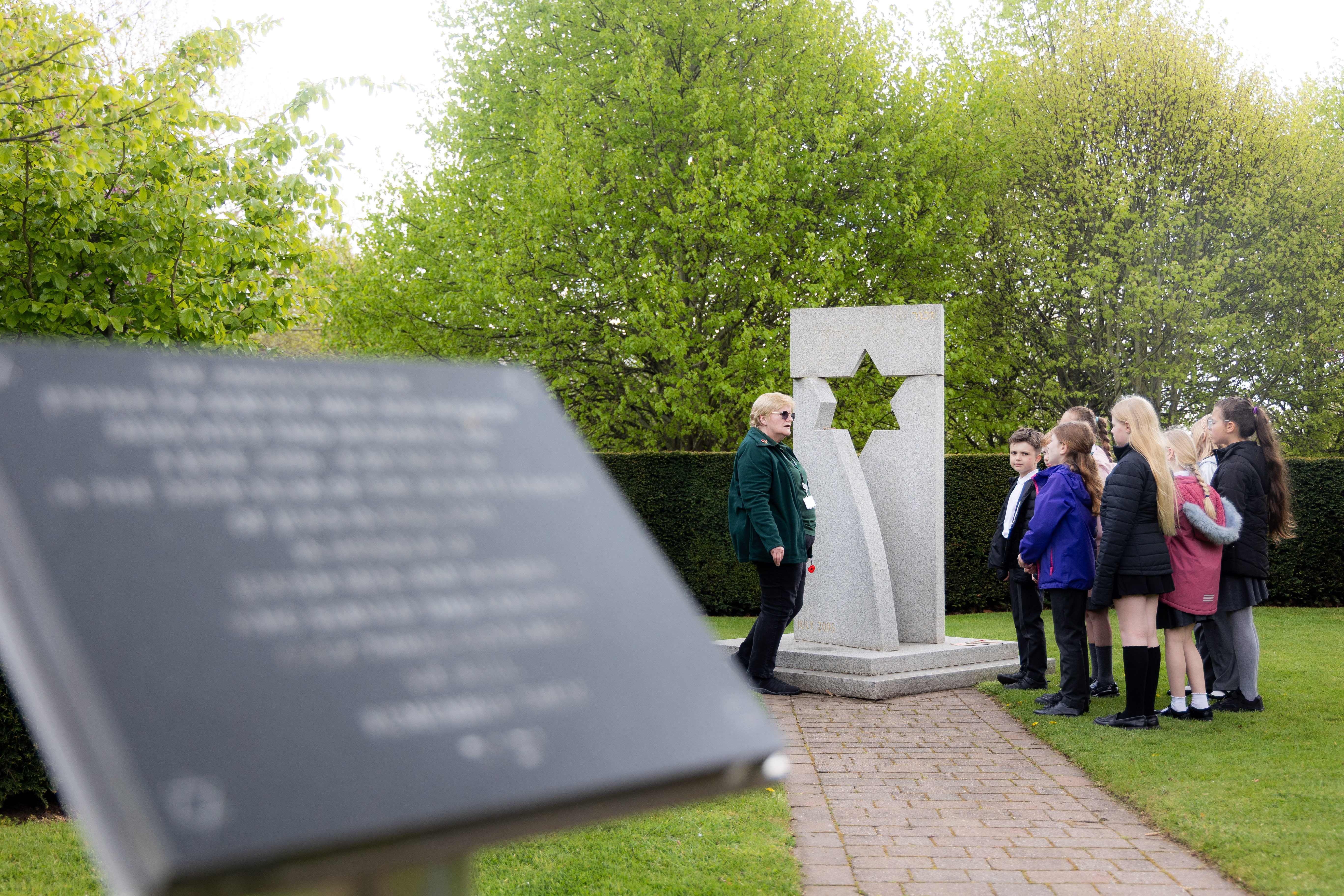 Key Stage Two students exploring the Association of Jewish Ex-Servicemen Memorial