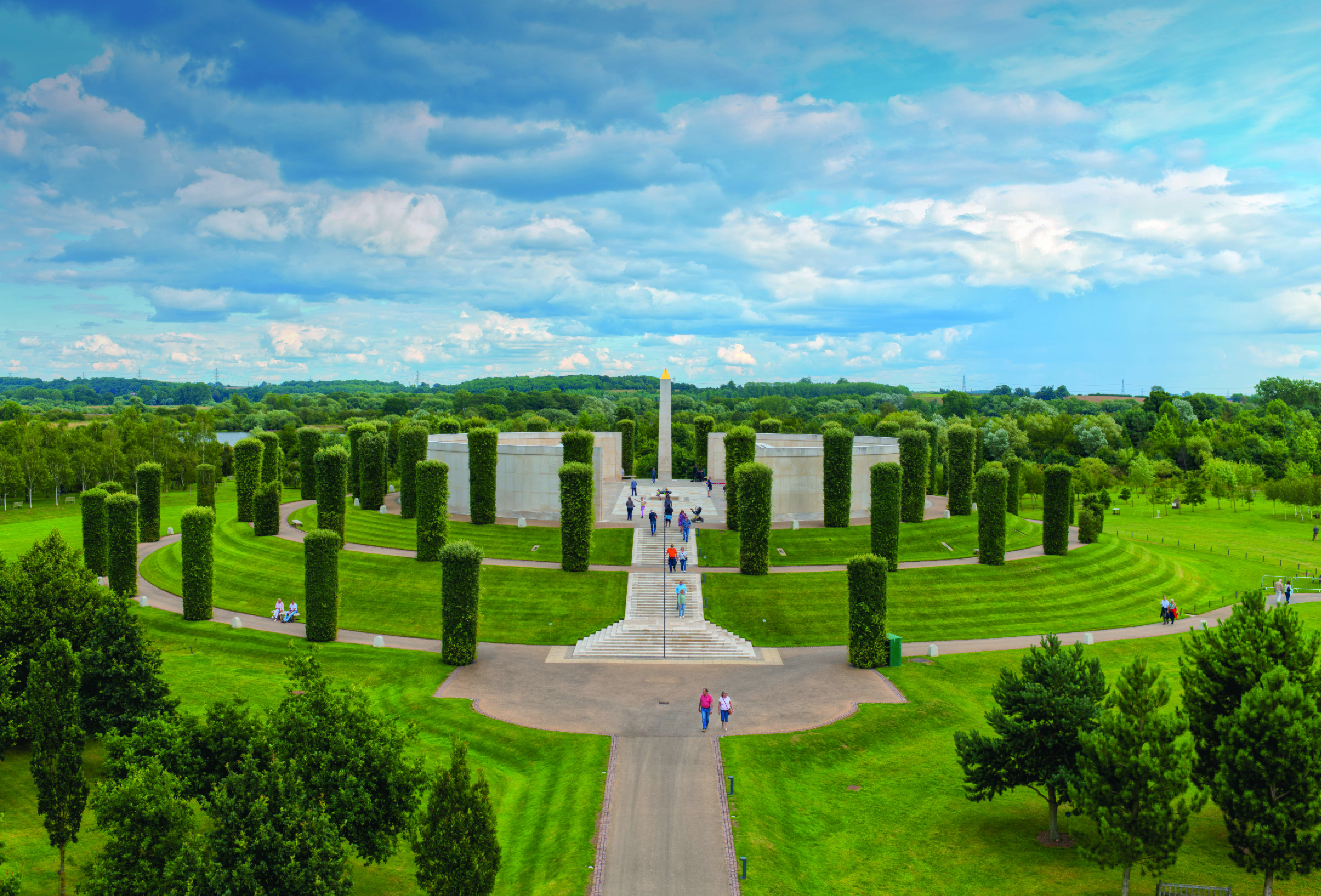 Armed Forces Memorial at the National Remembrance Gardens, with visitors exploring the memorial.