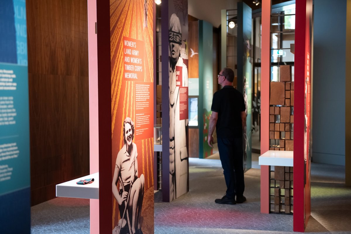 Visitor looking at the Gallery displays in the National Remembrance Gardens