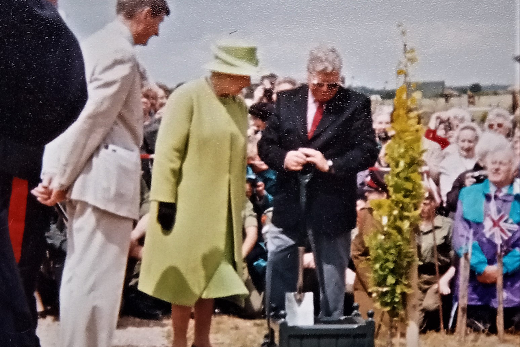 Her Late Majesty planting her Golden Jubilee Tree at the Arboretum in 2002