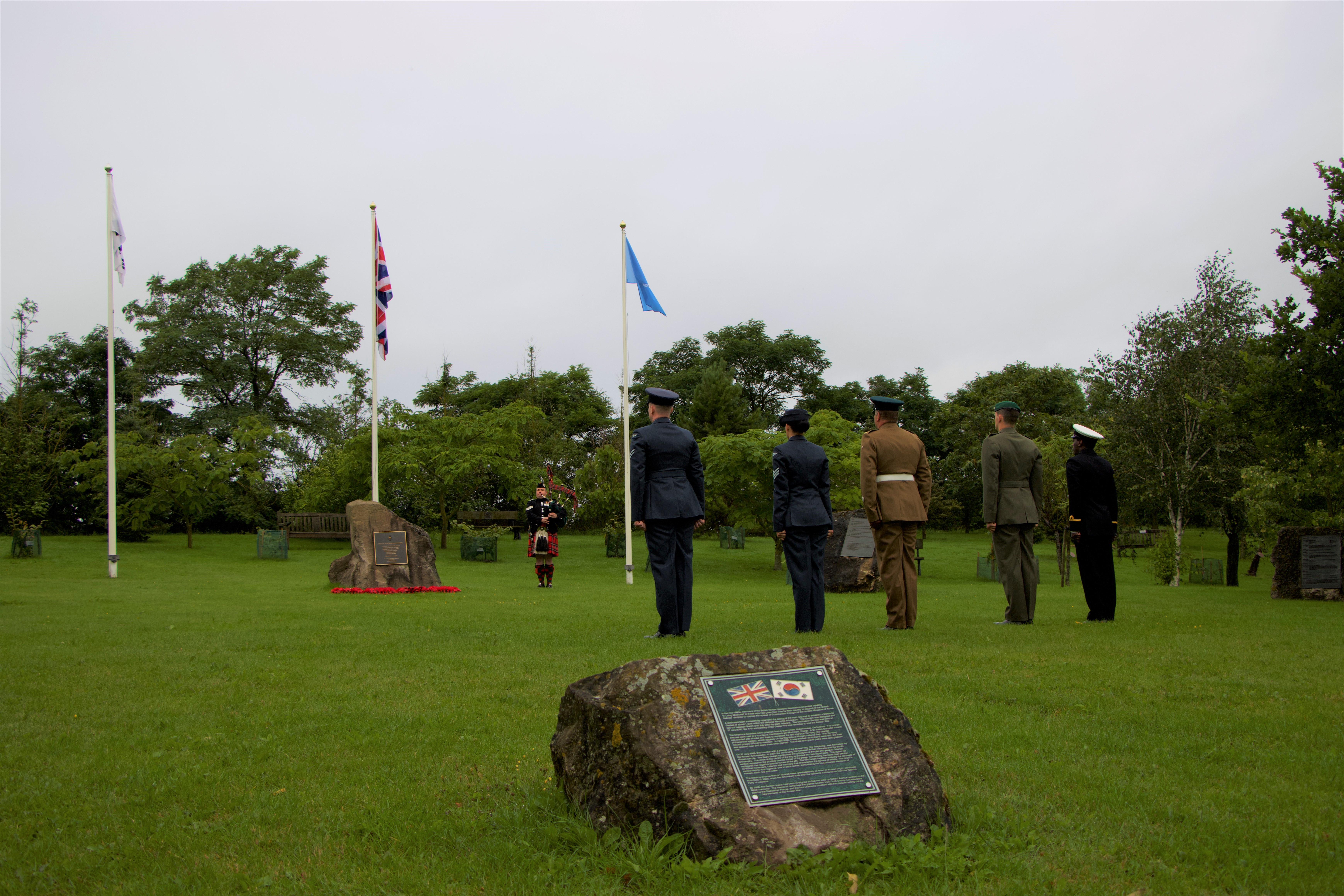 Armed Forces personnel laid wreaths at the British Korean Veterans Association Memorial Garden at the National Memorial Arboretum
